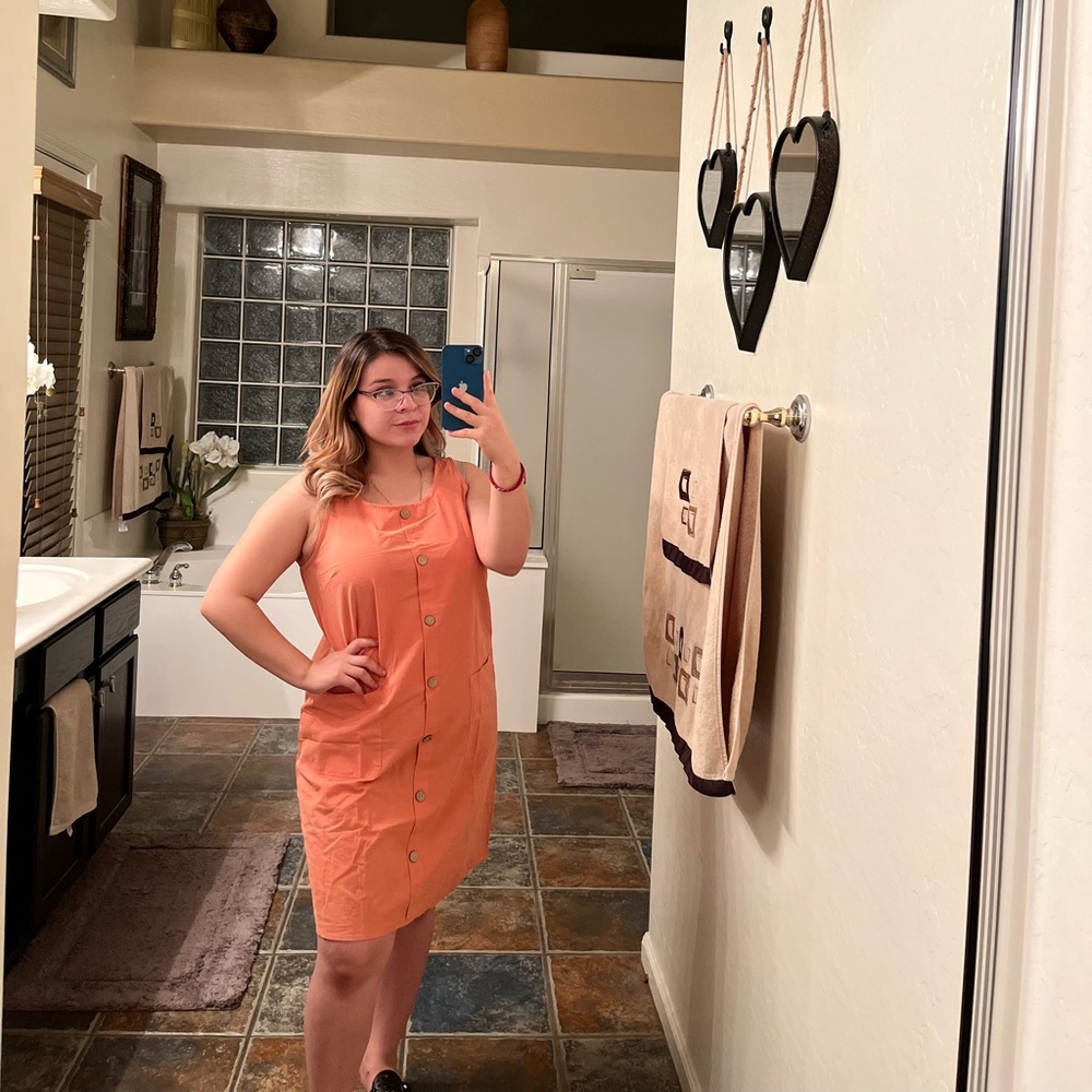 New midi orange dress very comfy. Not see true